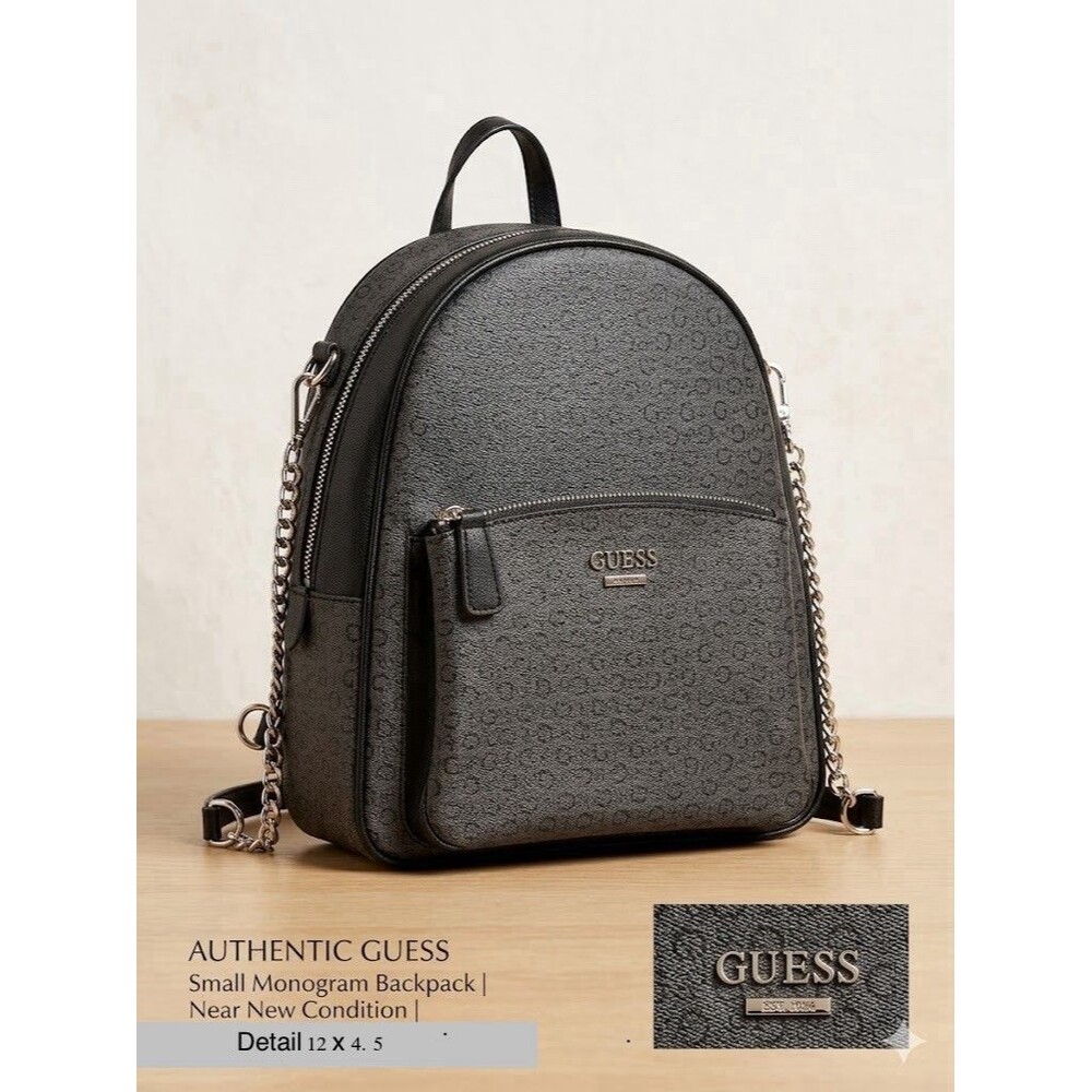 Guess women's mini backpack in a grey and black logo print Faux Leather